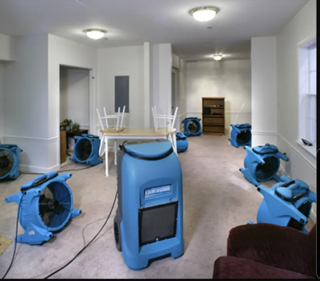 Air movers and dehumidifier setup for Water Damage Restoration in Ammon